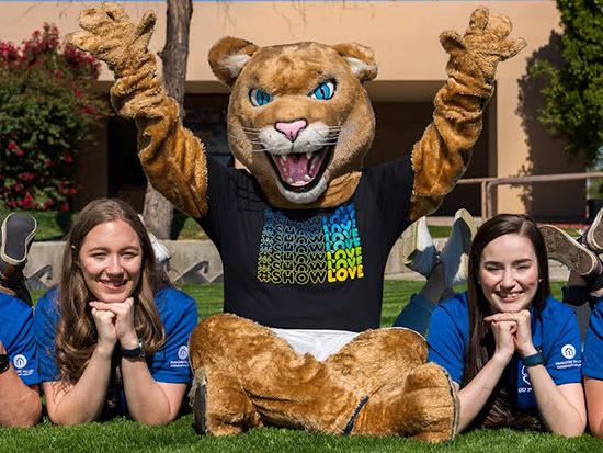 Paws the puma with students.